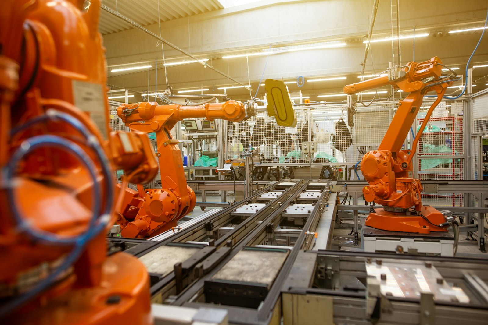 Robotic arms on an automated manufacturing production line